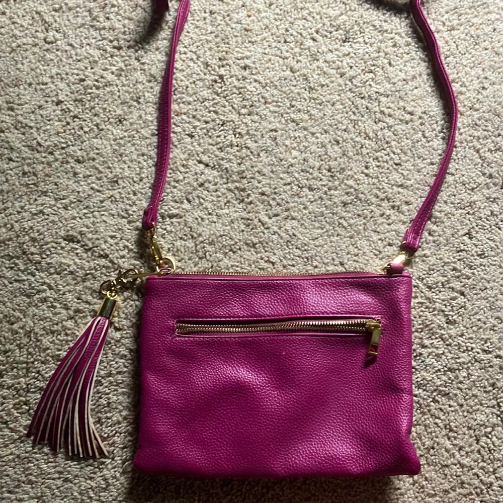 Magenta crossbody purse with tassel